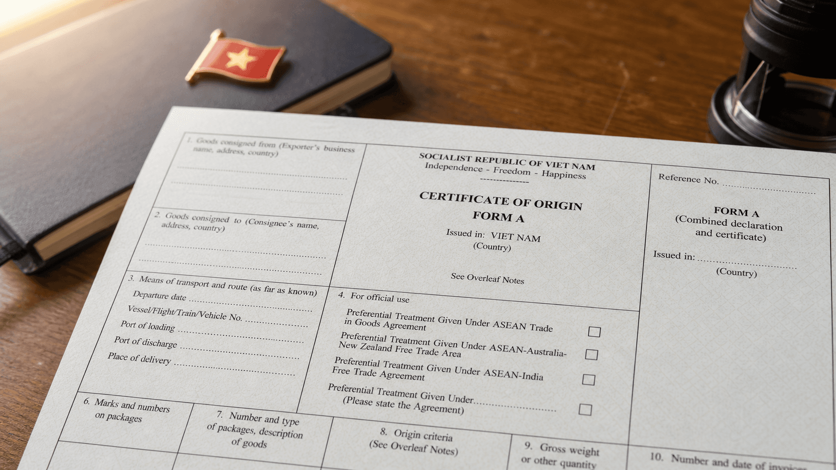 Close-up of a Vietnamese Form B Certificate of Origin document on a wooden desk with a black ink stamp partially visible and a Vietnamese flag pin on a notebook nearby