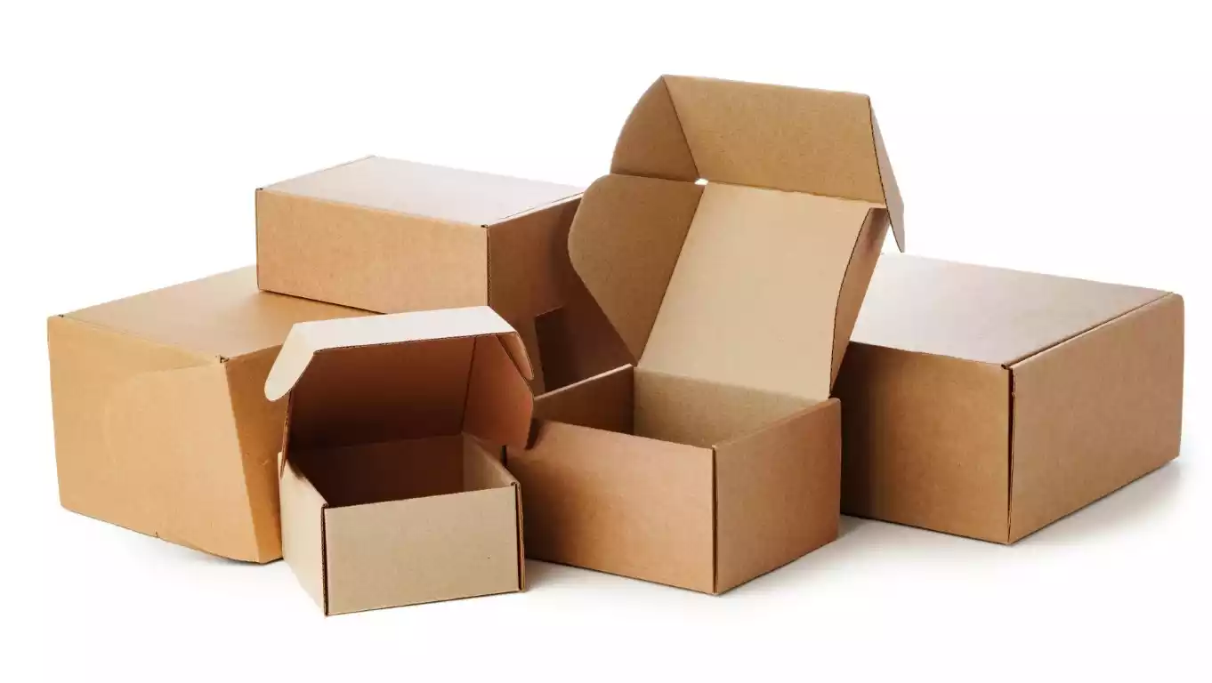 Stacked brown cardboard mailer boxes