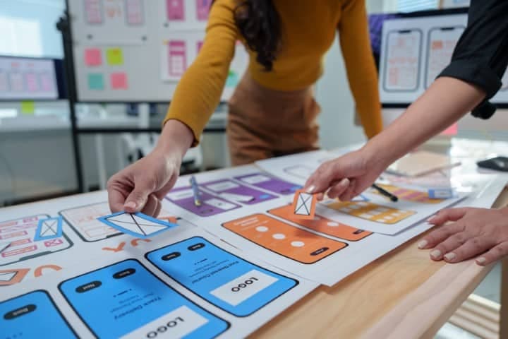Designers collaborating on sustainable label design